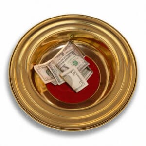 photo of Church offering plate with some currency in it